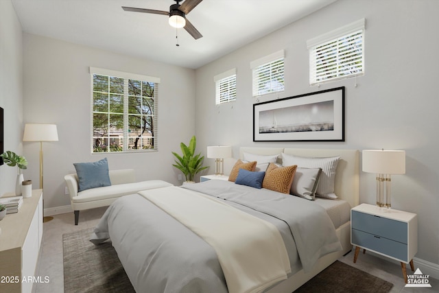 20644 W Mariposa St, Buckeye, AZ 85396 - bedroom with baseboards and a ceiling fan