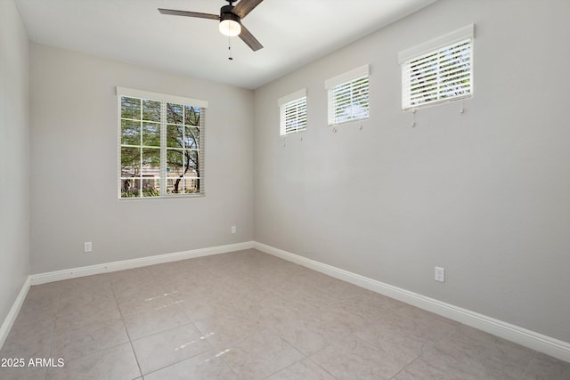 20644 W Mariposa St, Buckeye, AZ 85396 - spare room featuring a ceiling fan, baseboards, and light tile patterned floors