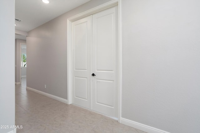 20644 W Mariposa St, Buckeye, AZ 85396 - hallway with baseboards, light tile patterned flooring, and recessed lighting