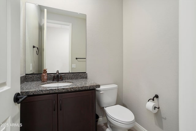 20644 W Mariposa St, Buckeye, AZ 85396 - half bath featuring vanity, toilet, and baseboards