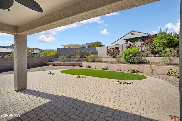 20644 W Mariposa St, Buckeye, AZ 85396 - view of patio / terrace with ceiling fan and a fenced backyard