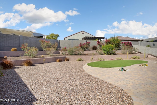 20644 W Mariposa St, Buckeye, AZ 85396 - fenced backyard featuring a patio area