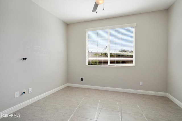 20644 W Mariposa St, Buckeye, AZ 85396 - spare room with baseboards, ceiling fan, and light tile patterned floors