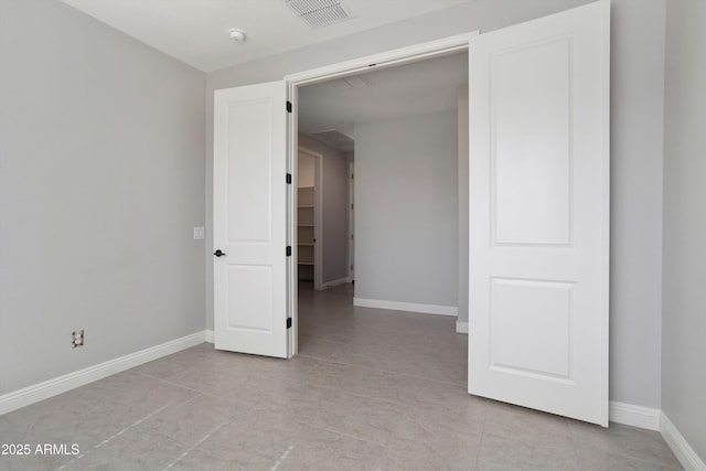 20644 W Mariposa St, Buckeye, AZ 85396 - unfurnished room featuring baseboards and light tile patterned floors