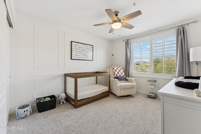 10252 E Butherus Dr, Scottsdale, AZ 85255 - carpeted bedroom featuring a nursery area and a ceiling fan