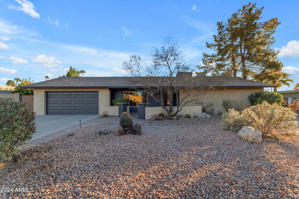 single story home with a garage