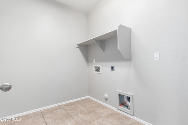 laundry room with hookup for a washing machine, light tile patterned floors, gas dryer hookup, and electric dryer hookup