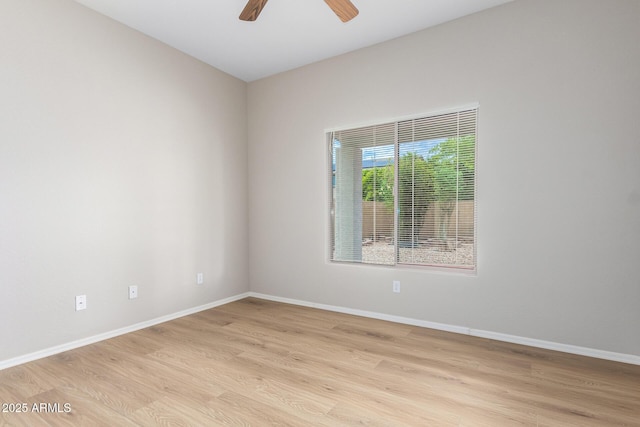 unfurnished room with ceiling fan and light hardwood / wood-style flooring