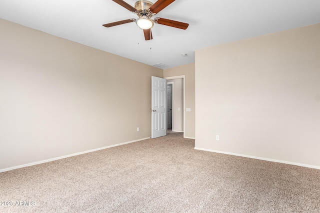 unfurnished room with carpet flooring and ceiling fan