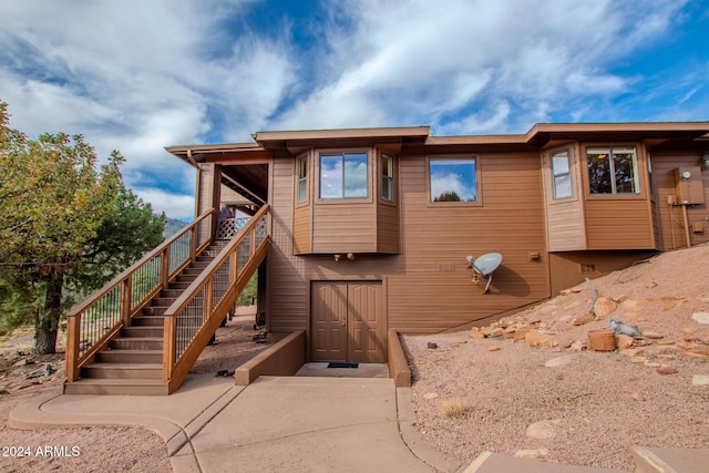 6641 W Wolfpaw Ln, Pine, AZ 85544 - back of house with stairway