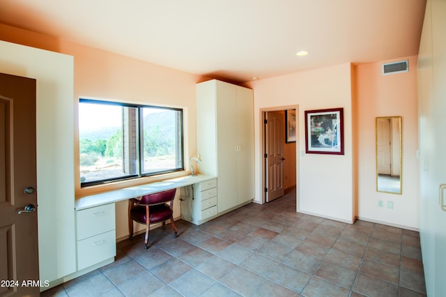 6641 W Wolfpaw Ln, Pine, AZ 85544 - office with built in desk and baseboards