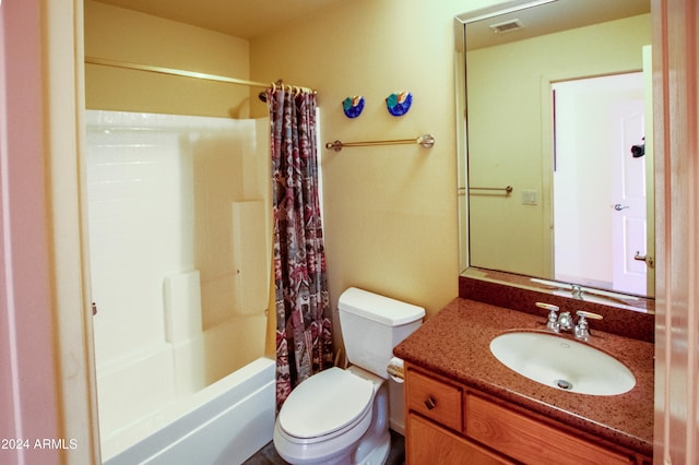 full bathroom featuring toilet, vanity, and shower / tub combo with curtain