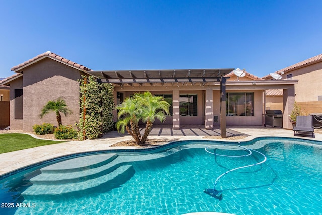 outdoor pool with a pergola, fence, a patio area, and a grill