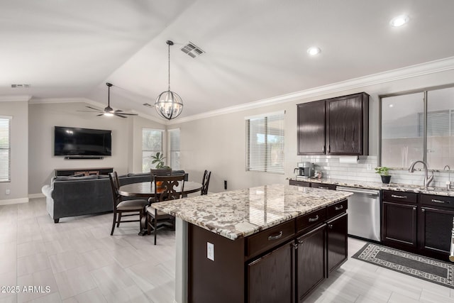 kitchen featuring dark brown cabinets, visible vents, a sink, and dishwasher