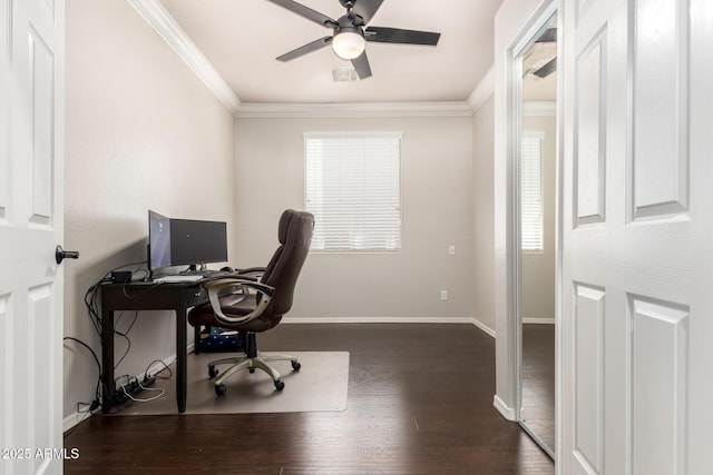 office space with baseboards, ornamental molding, ceiling fan, and wood finished floors