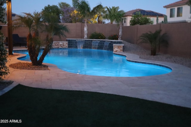 view of pool featuring a fenced backyard, a fenced in pool, and a patio