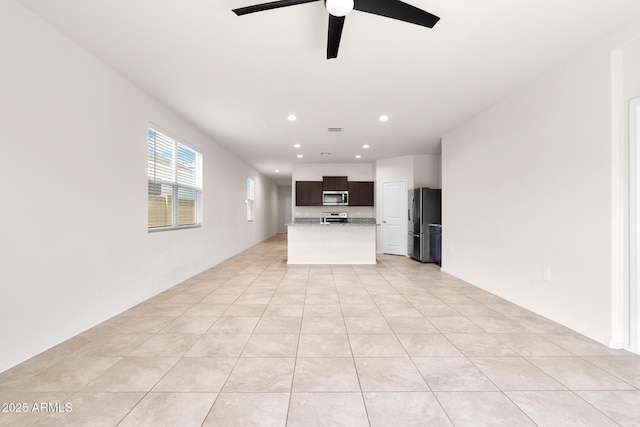 5269 E Gummite Dr, San Tan Valley, AZ 85143 - unfurnished living room with recessed lighting, light tile patterned floors, and a ceiling fan