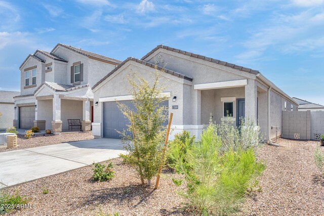 5269 E Gummite Dr, San Tan Valley, AZ 85143 - view of front of property with driveway, stucco siding, fence, and an attached garage