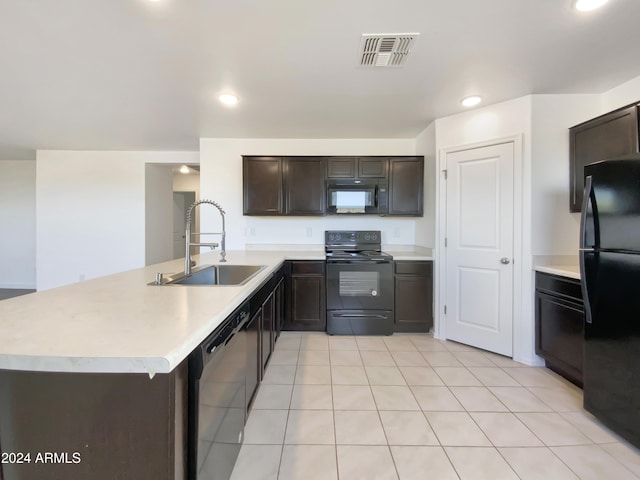 kitchen with kitchen peninsula, dark brown cabinets, sink, black appliances, and light tile patterned flooring