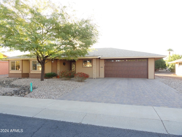 view of front of home featuring a garage