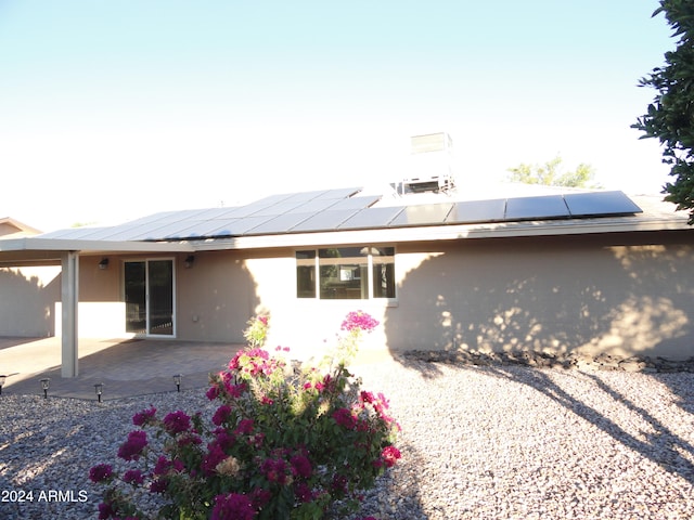 rear view of property with a patio