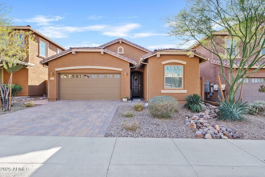 view of front of home with a garage