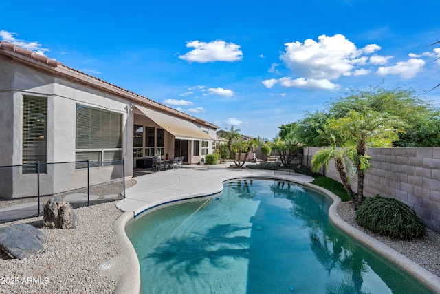 view of pool with a patio, a fenced backyard, and a fenced in pool