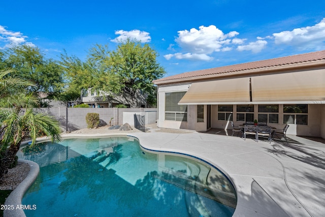 view of pool featuring a patio area, a fenced backyard, and a fenced in pool