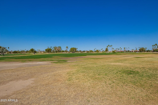 view of property's community featuring a lawn