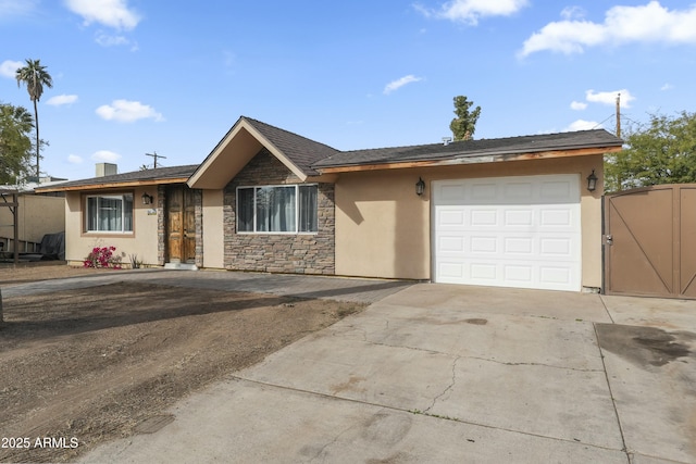 ranch-style home with a garage