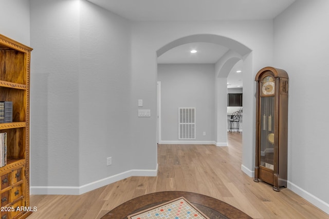 hall featuring hardwood / wood-style floors