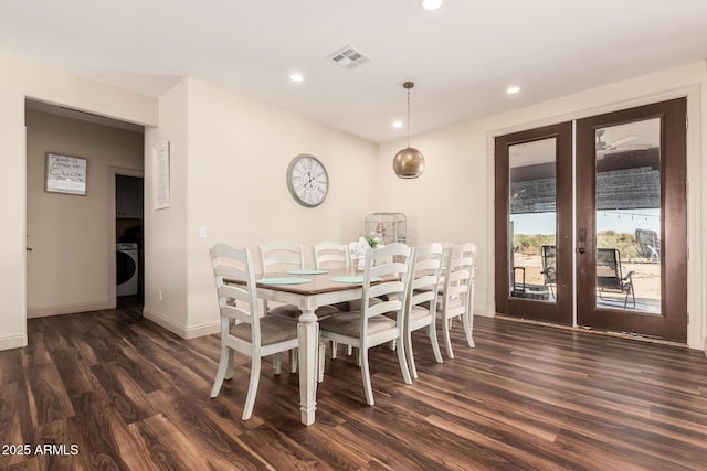 dining space featuring recessed lighting, dark wood-type flooring, visible vents, french doors, and washer / clothes dryer