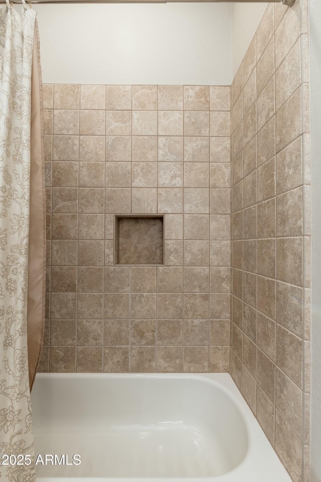 bathroom featuring shower / bath combo