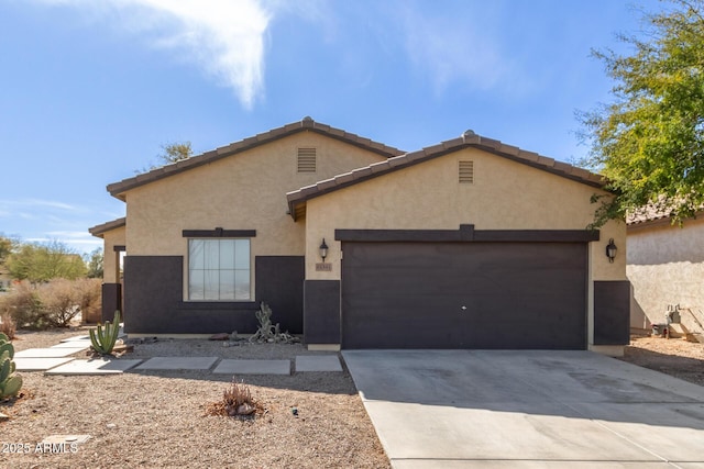 view of front of property featuring a garage