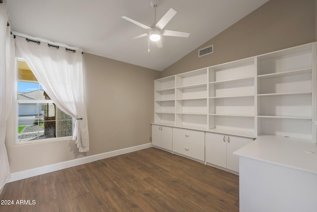 interior space featuring ceiling fan, dark hardwood / wood-style floors, and vaulted ceiling