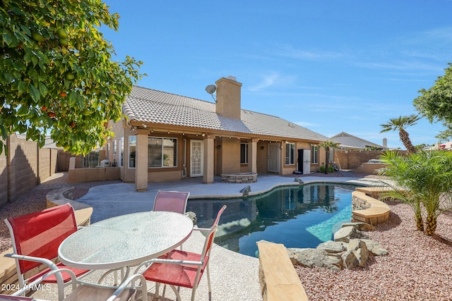 view of pool featuring a patio