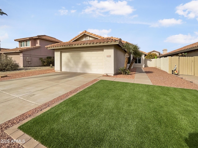 view of front of house featuring a front lawn and a garage