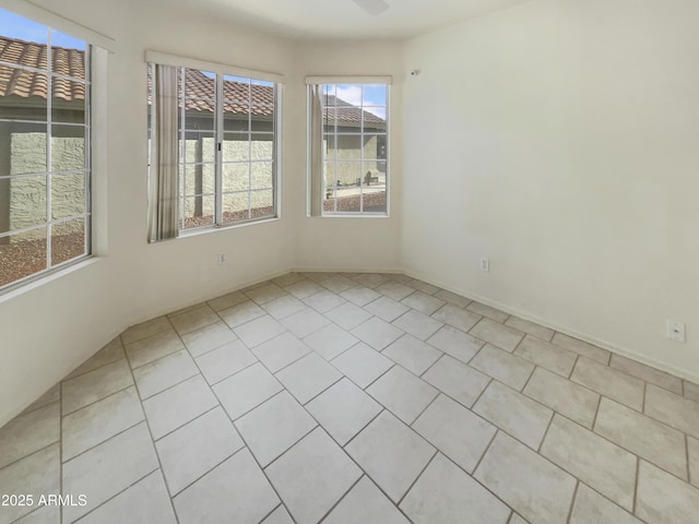 empty room featuring light tile patterned flooring