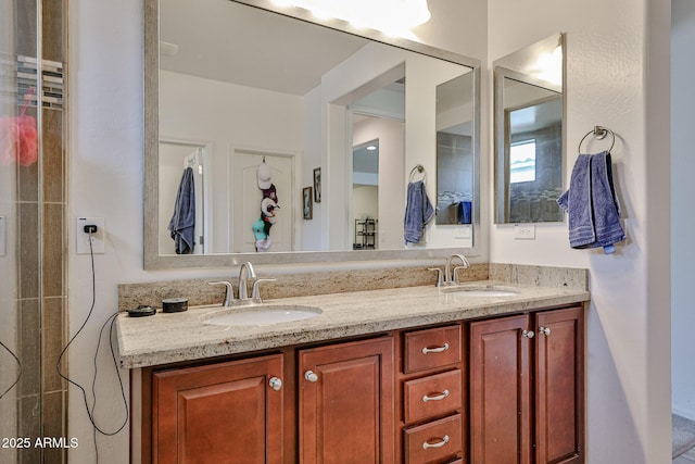 full bathroom featuring a sink and double vanity