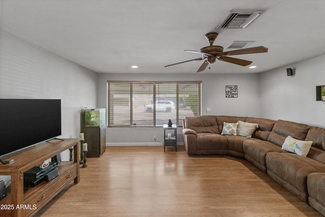 living area featuring recessed lighting, visible vents, light wood finished floors, and ceiling fan
