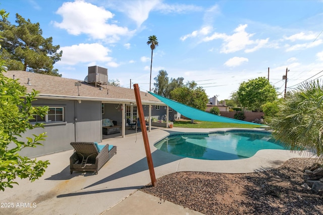 view of swimming pool featuring central air condition unit, a fenced backyard, a patio, and a fenced in pool