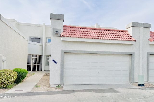 view of front of property with a garage