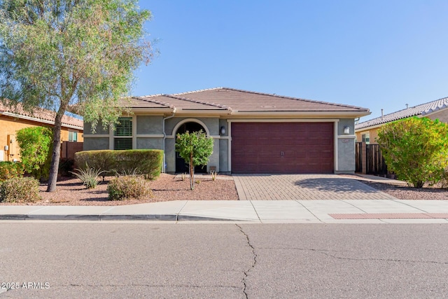 view of front of property with a garage