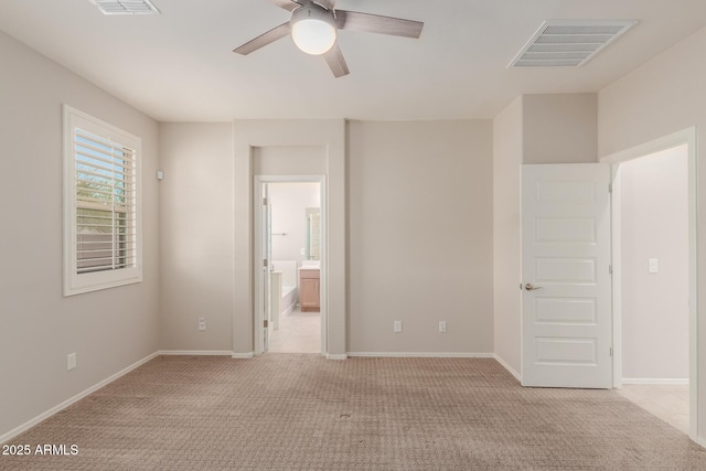 empty room with light carpet and ceiling fan