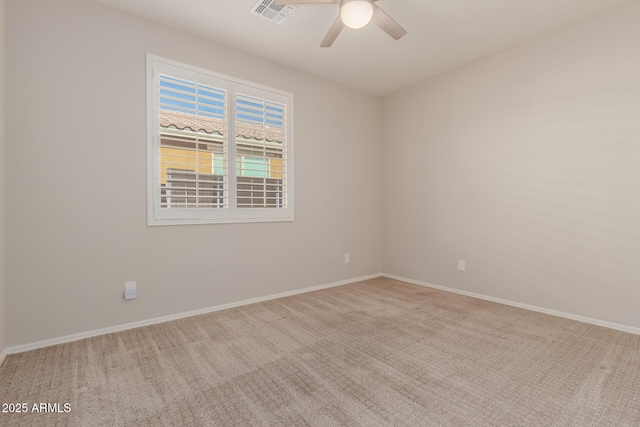 carpeted empty room with ceiling fan