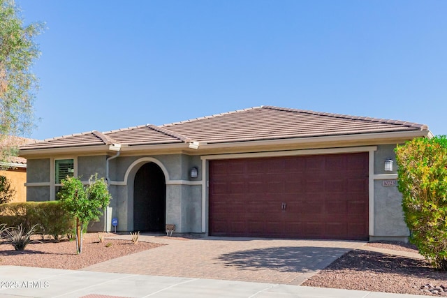 view of front of home with a garage