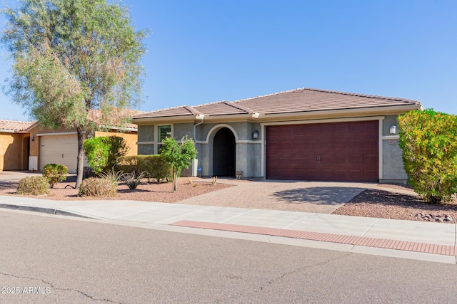 view of front of property featuring a garage