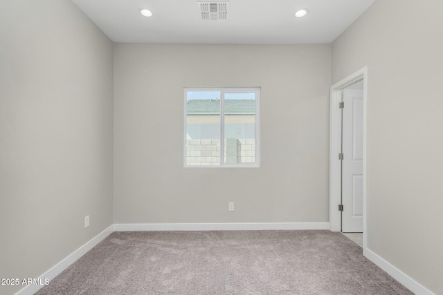 unfurnished room featuring carpet floors, recessed lighting, visible vents, and baseboards