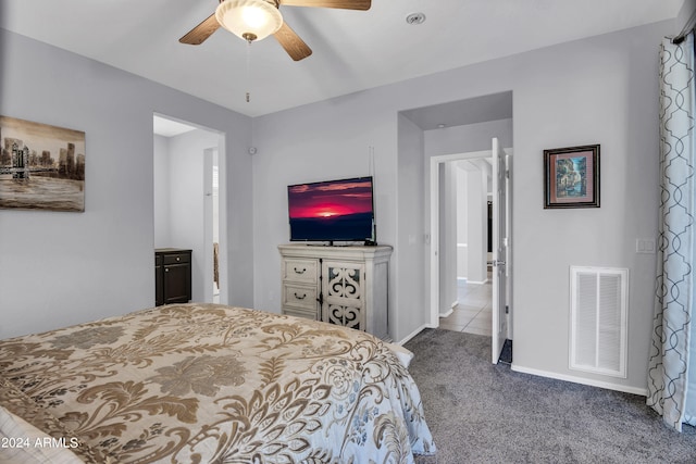 bedroom featuring ceiling fan and carpet flooring