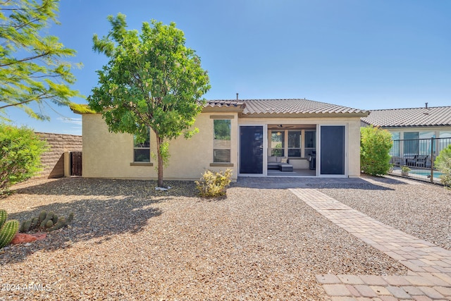 rear view of house with a patio area